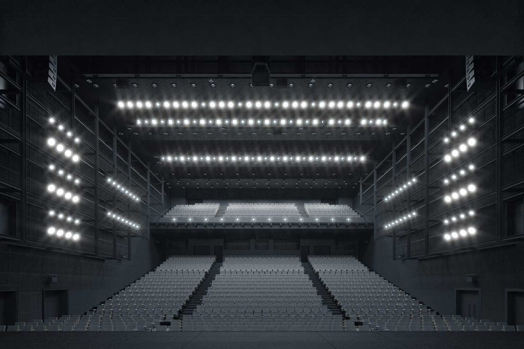 Box1000の客席の様子。灰色で整えられた空間は、シックでクール。可動式1階席と2階席がそびえたつ。